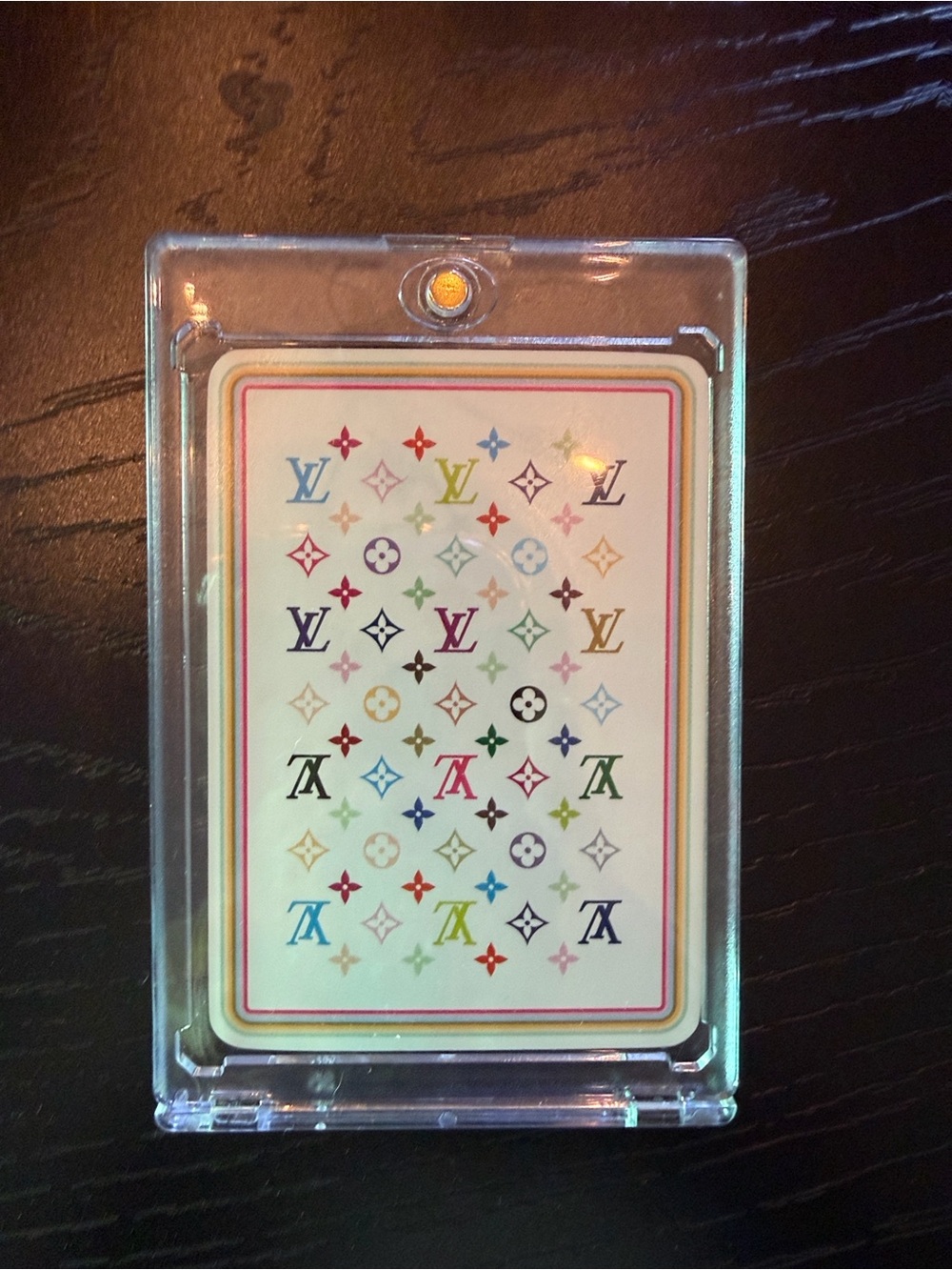 LV playing card in case